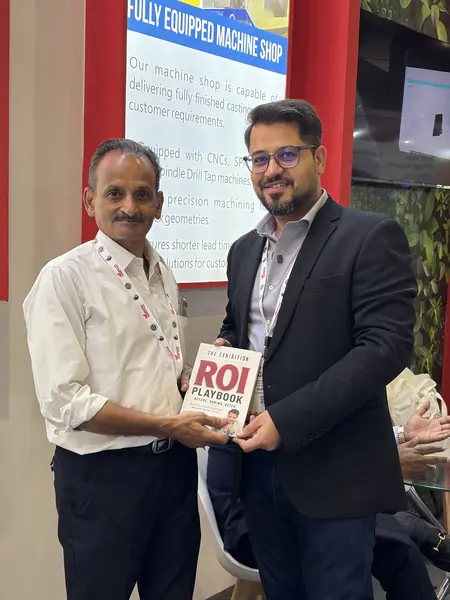 Reader with The Exhibition ROI Playbook 7